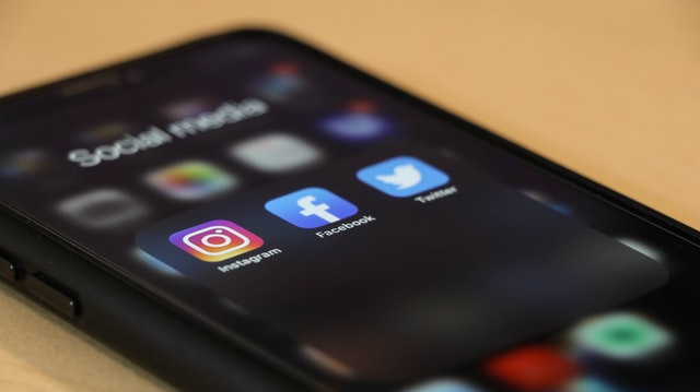 phone with social media icons